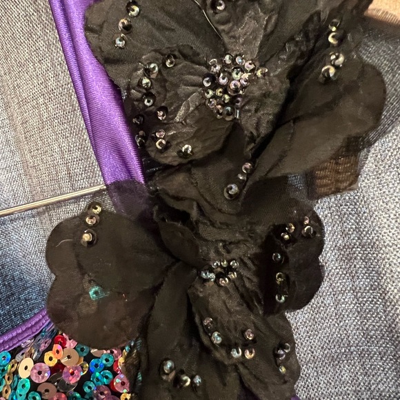 Multi-colored sequin bodice with black straps and snaps around neck. - Picture 5 of 7